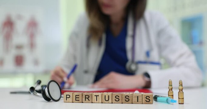 A healthcare worker studies pertussis while preparing essential medical supplies in a clinical setting