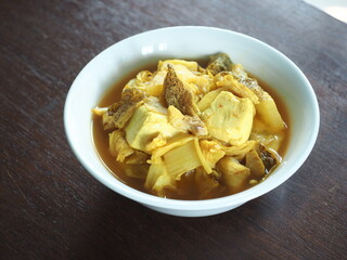 GAENG SOM, Thai sour curry, with grouper fish, soft tofu and vegetables