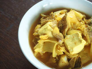 GAENG SOM, Thai sour curry, with grouper fish, soft tofu and vegetables