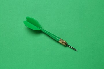 One dart arrow on green background, top view