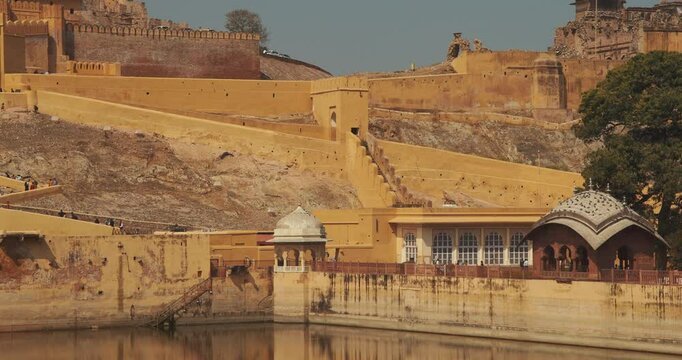 Jaipur, Rajasthan, India. View Of Amber Fort. Amer Fort Or Amber Fort, Amer Situated On Forested Hill. Amer Palace Is Great Example Of Rajput Architecture. Amber Fort Principal Tourist Attraction In