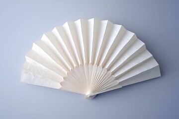 Off-white paper fan, closed, pale background.