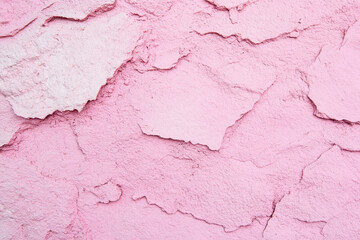 Fototapeta premium Pink textured background with rough surface and creative design aesthetic