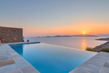 Fototapeta premium Luxury Infinity Pool Villa Sunset Ocean View Greece Island Summer Vacation Mediterranean Sea Resort Tranquil Relaxing Holiday Paradise Scenic Escape Stunning 