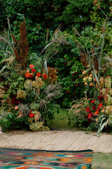 Modern stylish Wedding ceremony decorations. Wild flowers. The autumnal wedding decor. The autumn colors flowers bouquet. Natural beautiful wedding decorations. Minimalistic wedding decorations. Ethno