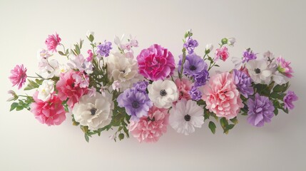 Fototapeta premium Colorful floral arrangement featuring anemones, peonies, and other blooms on a neutral background