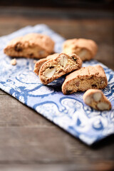 Cantuccini (Italian cookies) on dark wooden background. Close up