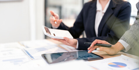 Business people Consulting meeting working and brainstorming new business project, using laptop at desk office.