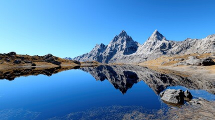 Serene mountain landscape reflecting in calm water.