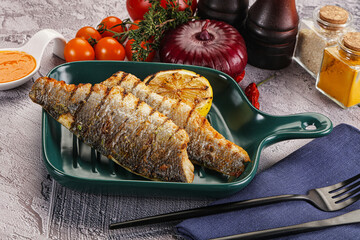 Grilled seabass fillet with lemon