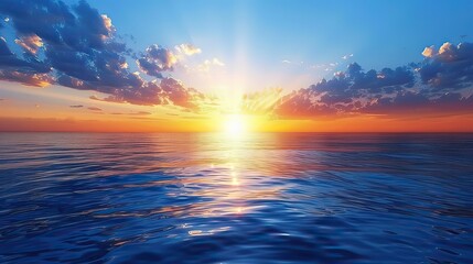 Fototapeta premium A scenic horizontal landscape of a sunset over the ocean.