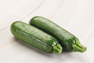 Raw green ripe zucchini vegetable