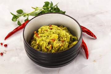 Guacamole with avocado, tomato and chili