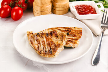 Grilled pork steak with sauce