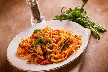 linguine with shrimp tomato sauce and parsley