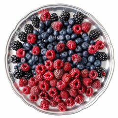 A platter of assorted berries including blueberries, raspberries, and blackberries