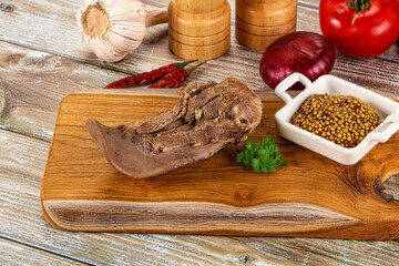 Steamed pork tongue with mustard