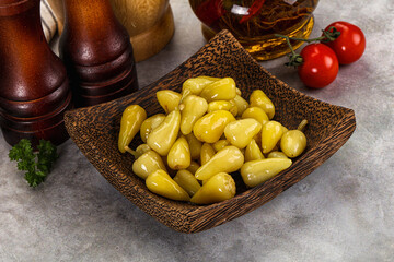 Turkish traditional marinated mini chili peppers