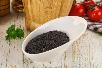Black dry Nigella seeds in the bowl