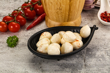 Mozzarella balls cheese in the bowl