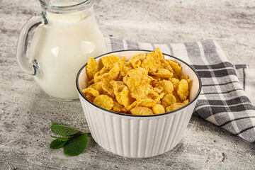 Corn flakes with milk for breakfast