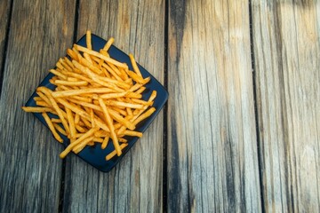 French fries with ketchup. Thin cut french fries with a side of ketchup.