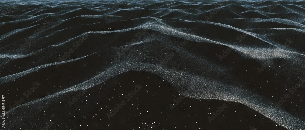 Poster subtle texture of fine black sand creates an enigmatic desert landscape at twilight in a barren envi
