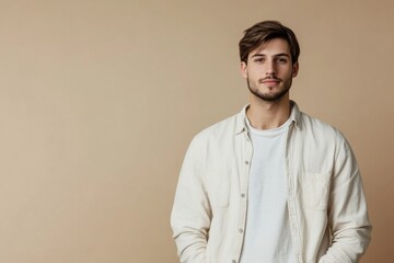 Portrait of a young man with a neutral expression in a light toned setting ideal for text placement. Generative AI