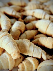 Small croissants and cookies in the plate, just cooked, homemade cookie