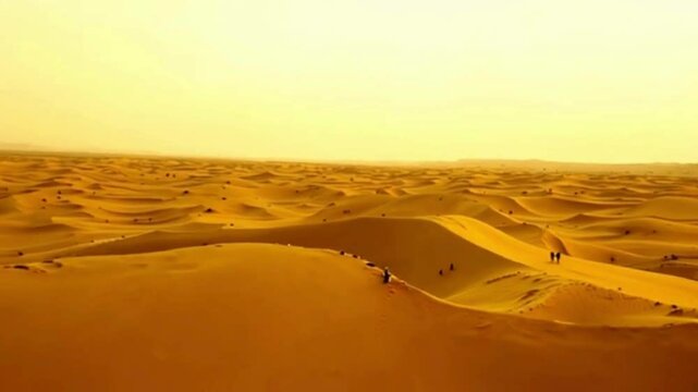 4K HD Golden Hour in a Desert. The Warm glow of The Setting sun Over Vast Sand Dunes illustration Video.