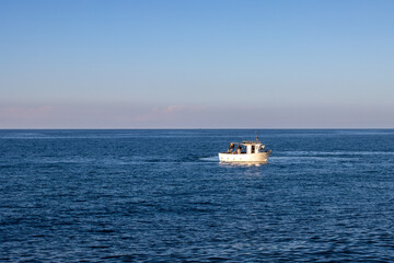 White boat on the sea, Sicily, Italy