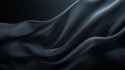 Fototapeta premium A black and white image of a piece of fabric with a very long, flowing edge