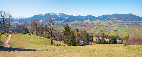 view to Brauneck and Blomberg mountain from the hiking trail opposite side, bavaria in march