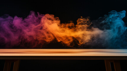 Fototapeta premium A wooden table radiates with mystique as vibrant orange and pink smoke billows up, its swirling shapes enhanced by the depth of the black backdrop.