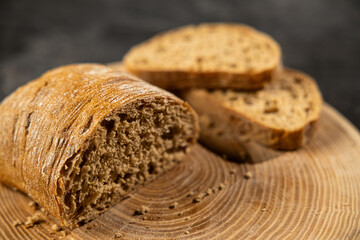 Rustic Homemade Bread Slices on Wooden Cutting Board