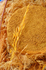 Rustic Honey Crumb Cheesecake with Dried Botanical Elements closeup