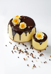 Chocolate-Glazed Cheesecakes with Edible Flowers and Crispy Pearls