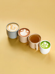 Assorted Hot Beverages with Latte Art on Minimalistic Beige Background