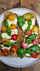 pizza with salami and tomatoes