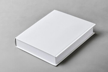 Fototapeta premium A single white book sits on top of a table