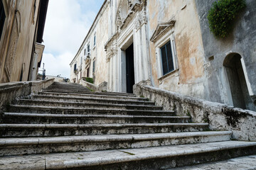 Fototapeta premium Stone Stairs Leading to Old Building Entrance