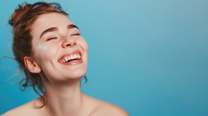 This is a portrait of a smiling young woman with shimmering glitter face paint, expressing joy and creativity. The image captures her relaxed and happy expression.