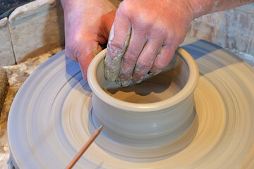 Hands Crafting Pottery