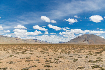 An aerial view of beautiful himalayan mountains at moray planes, passing through the keylong-leh road, in Ladakh, India.