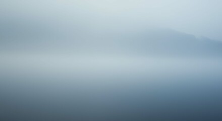 Obraz premium Serene Misty Lake Landscape Calm Water Fog Hill Background