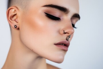 Obraz premium A close-up shot of a woman with a nose piercing, perfect for editorial or lifestyle use
