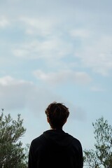 Man Contemplating Nature  Serene Outdoors Scene