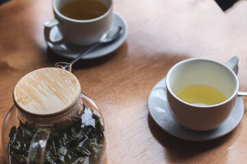 Two mugs of tea in a cafeteria top view