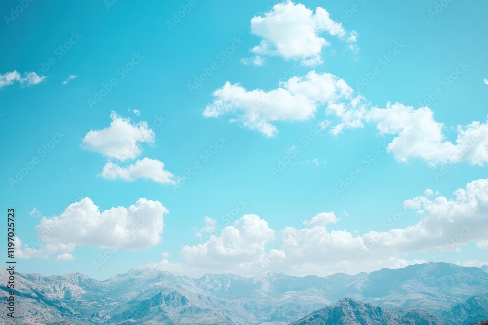 Aufkleber Bright blue sky with fluffy clouds above serene mountain landscape and open space for text or graphics. Generative AI