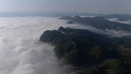 Clouds on high mountain peaks in the rainy season in the Asian rainforest..